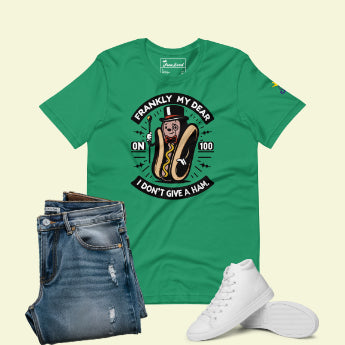 Kelly green t-shirt with 'Frankly my dear, I don't give a ham', paired with blue jeans and white sneakers.