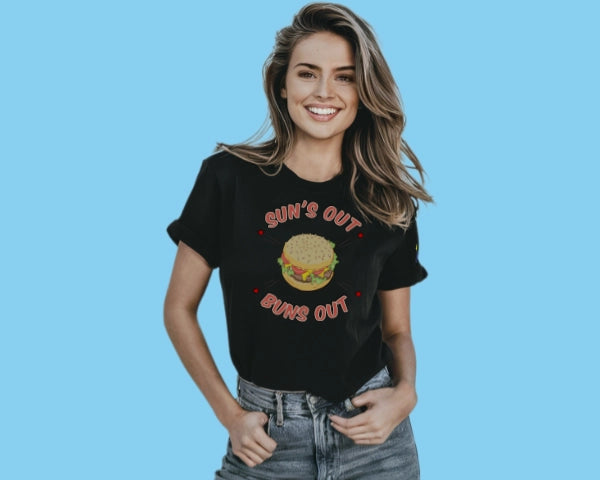 Smiling woman wearing t-shirt with 'Sun's out, buns out'